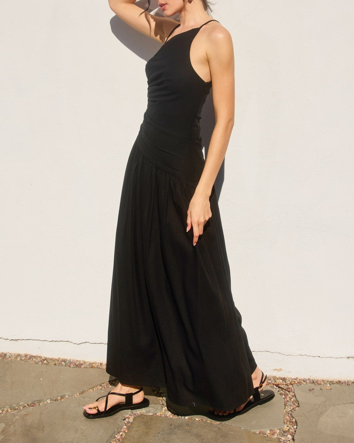 black cotton linen maxi dress, asymmetrical neckline dress, strappy summer dress, drop waist dress, cotton dress with tortoise trim, black vacation dress, linen blend maxi dress, warm weather event outfit
